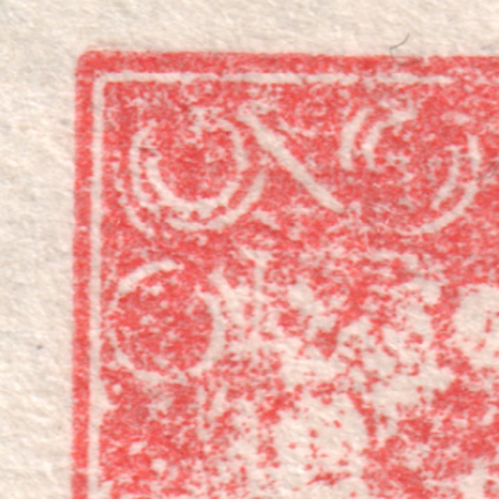 detail levého horniho rohu s odtrzenou barvou / detail of the upper left corner with torn-off ink